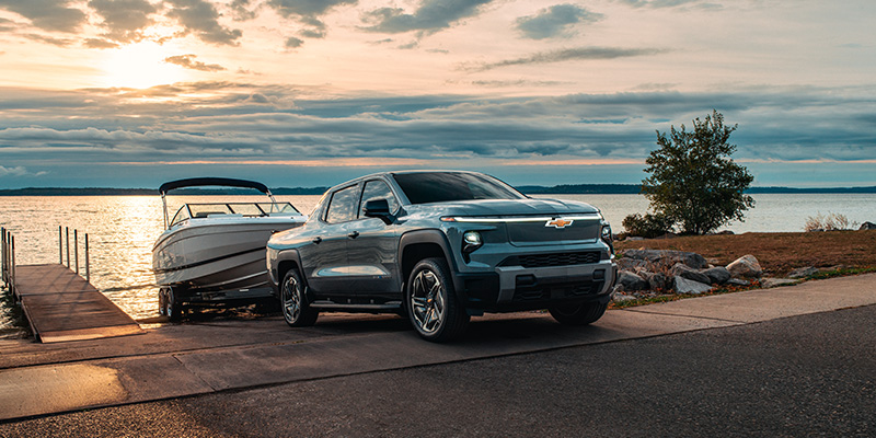 2026 Chevrolet Silverado EV on river side showing its heavy duty capabilities